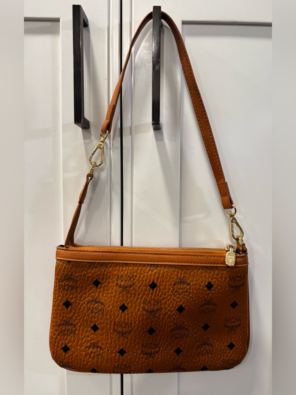 MCM Clutch Pouch Bag Purse in Visetos Original Cognac Medium